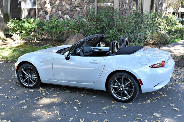zda MX-5 Miata continues the two-seat roadster's impressive tradition.
