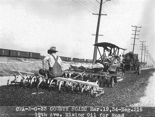 19th-ave-mixing-oil-for-road-mar-19-1934