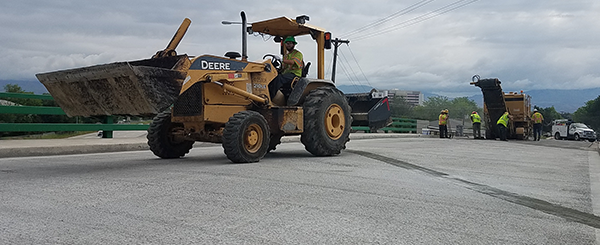 Crews wrap up the repavement of the Emerald St. overpass along I-184