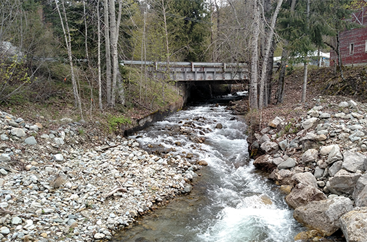 Water flows under ID-200B near Hope, Idaho.
