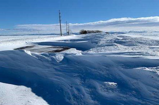 Drifting snow on ID-33 in Eastern Idaho
