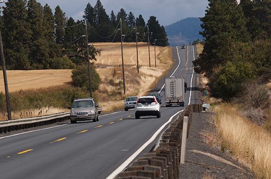 Cars drive by each other on US-95 with no passing lanes